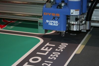 Titan UV printer and DYSS cutting table propel production